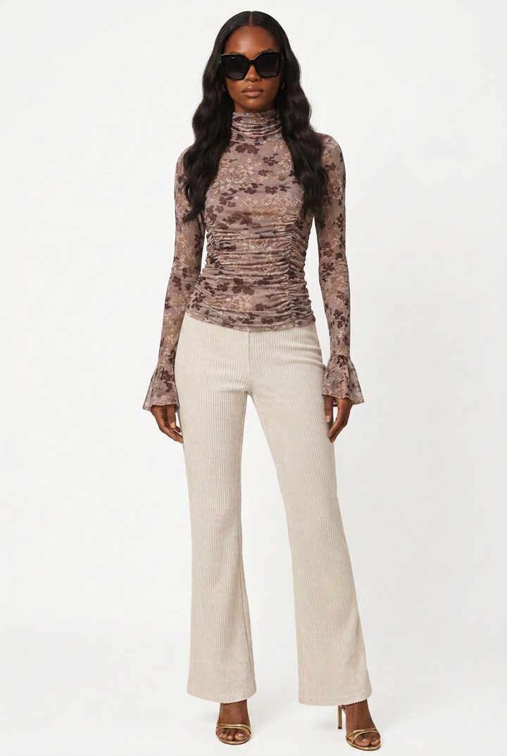 Cici wearing the floral top without hanging fabric