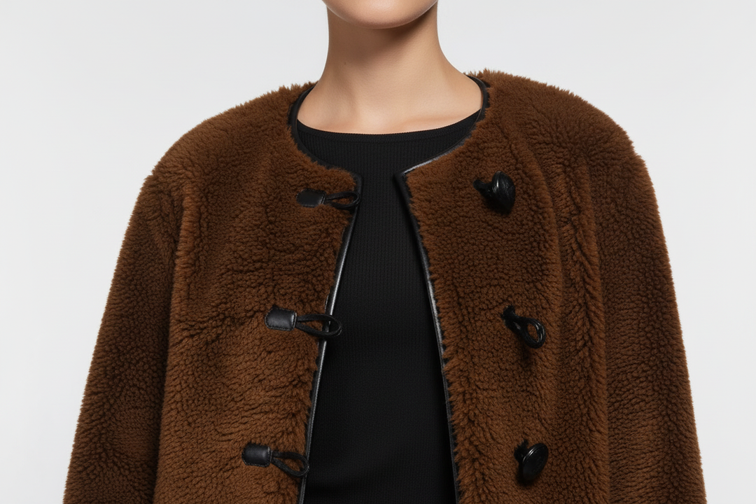 Close-up detail of brown faux fur jacket