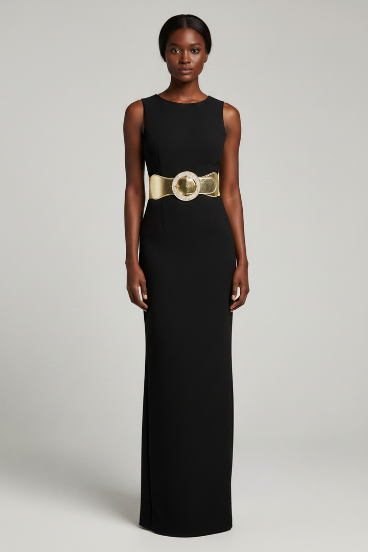 Close-up of model wearing gold belt