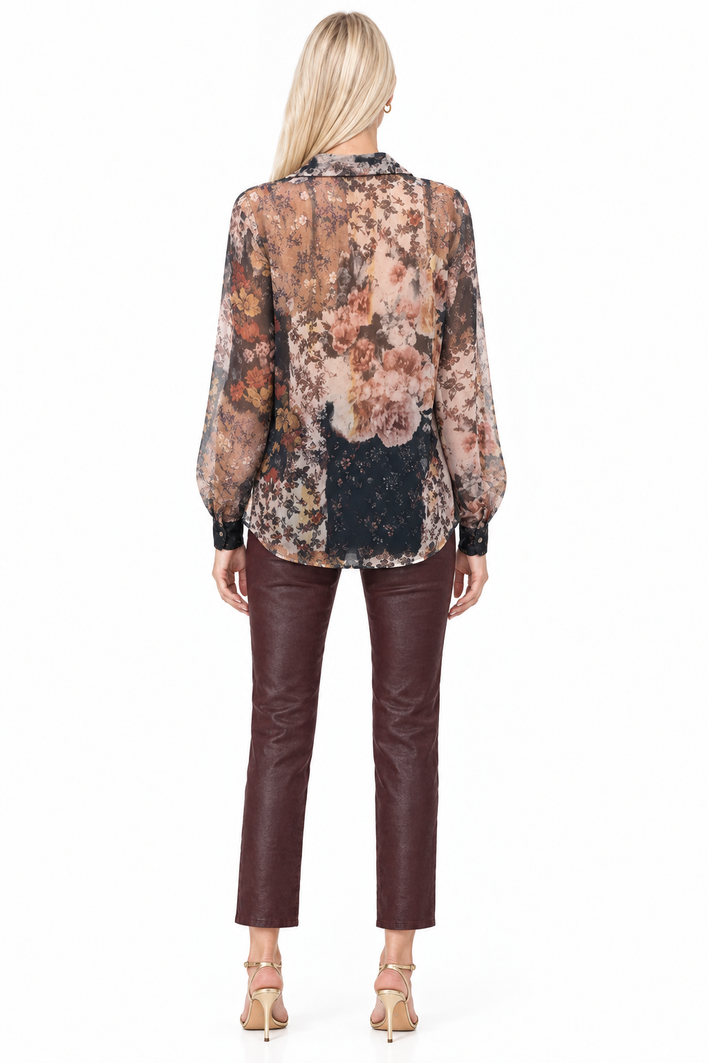 Back view of Tiffany wearing deep wine coated slim-straight pants and sheer floral blouse