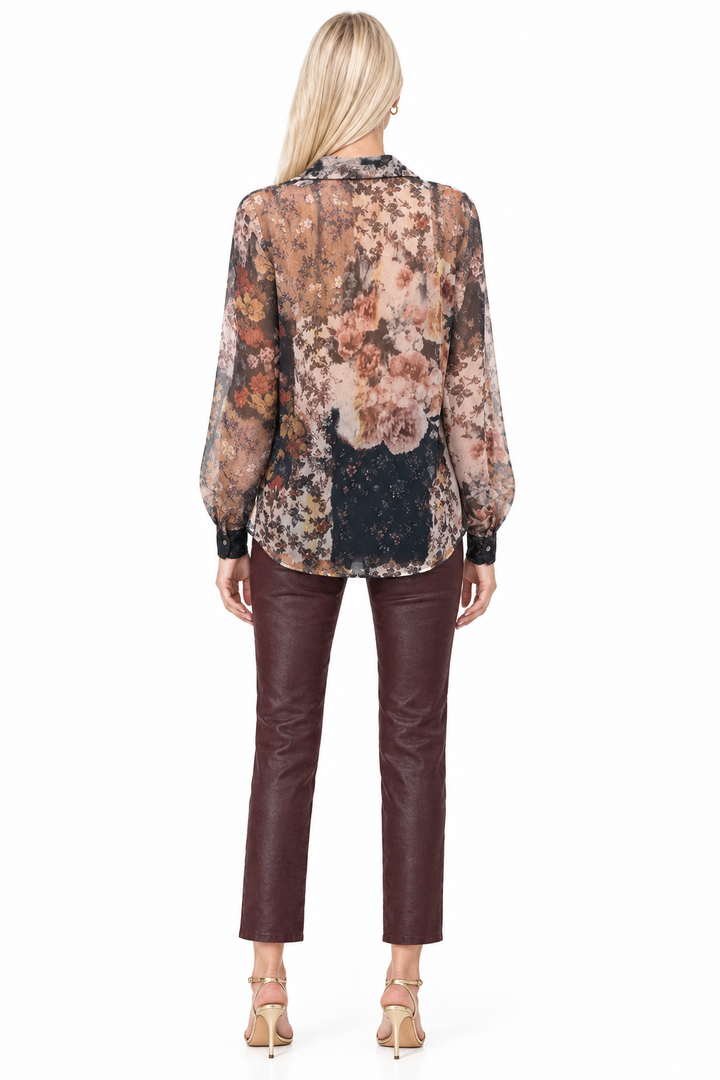 Back view of Tiffany wearing deep wine coated slim-straight pants and sheer floral blouse