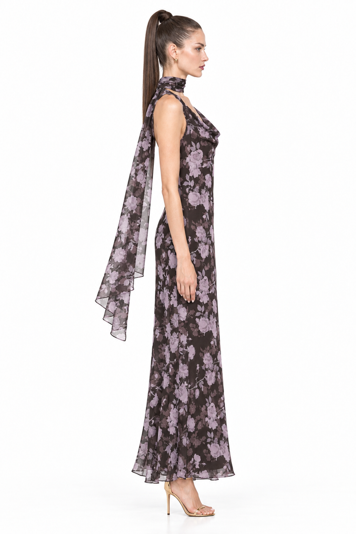 Side view of Sloane wearing Noelle floral chiffon maxi dress and matching scarf