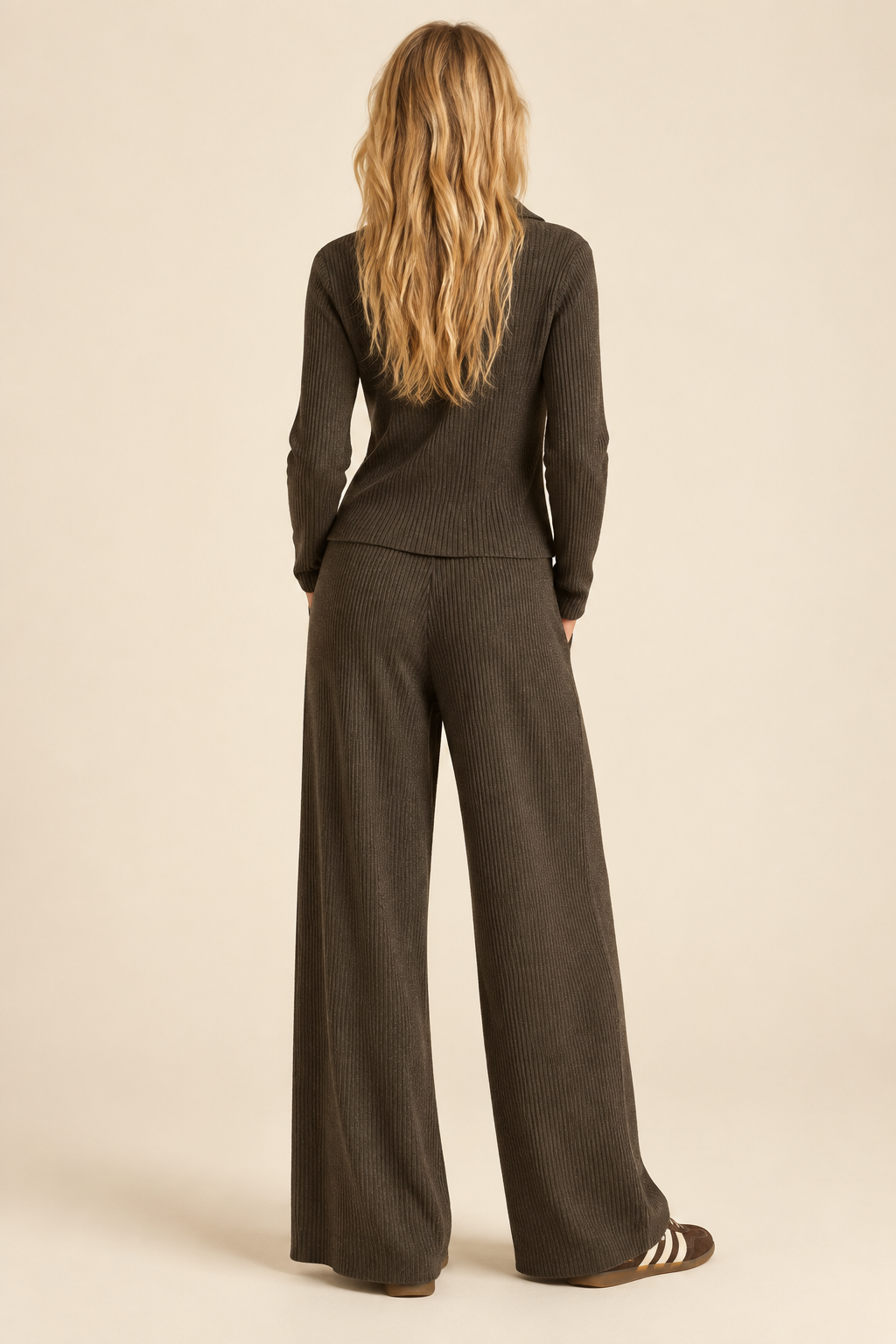 Back view of Tricia wearing Espresso straight leg ribbed knitted pants
