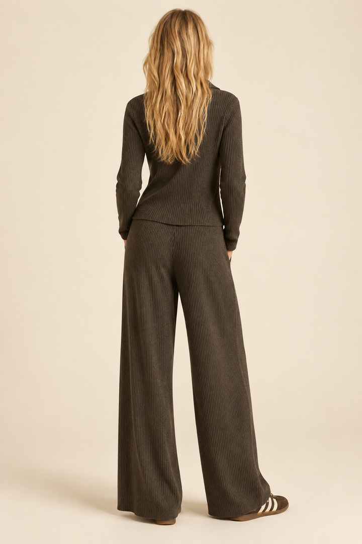Back view of Tricia wearing Espresso straight leg ribbed knitted pants