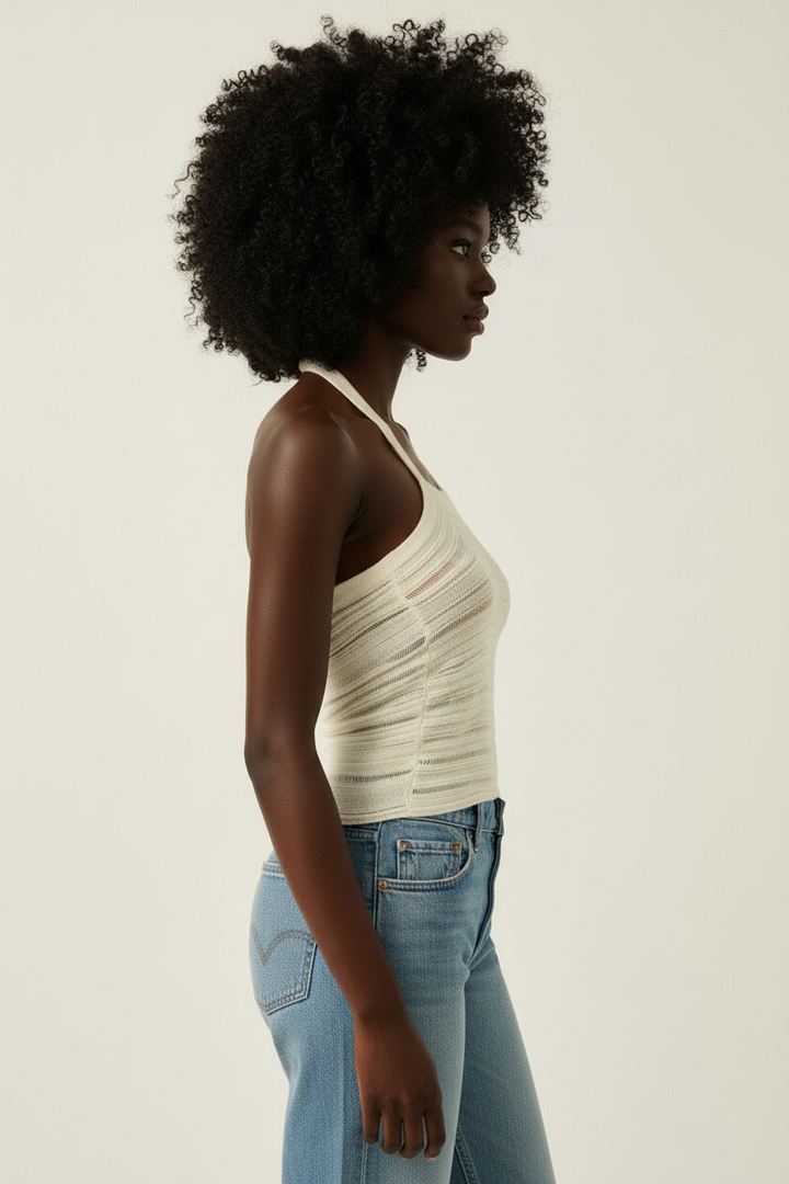 Off-white semi-sheer ladder knit asymmetrical halter top - side profile on white background
