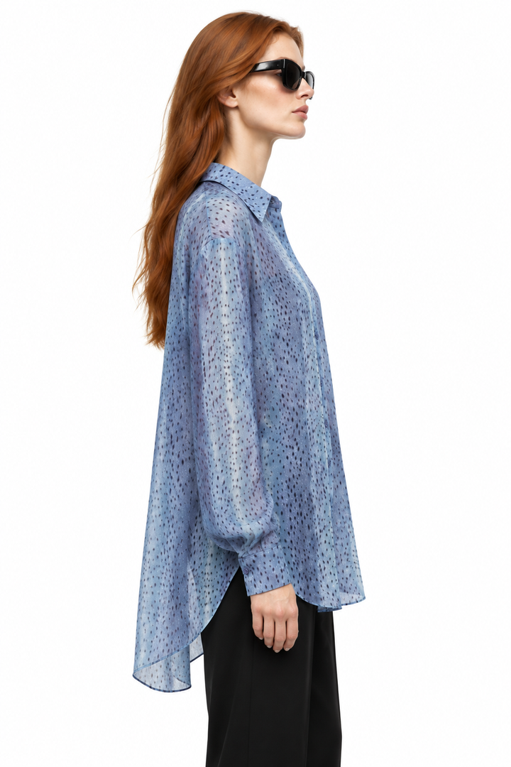 Redhead Beciga model wearing the Bambi Print Soft Woven Button Down Shirt untucked, side view