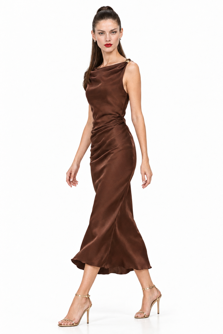 Sloane wearing Rum Raisin satin ruched midi dress, side pose