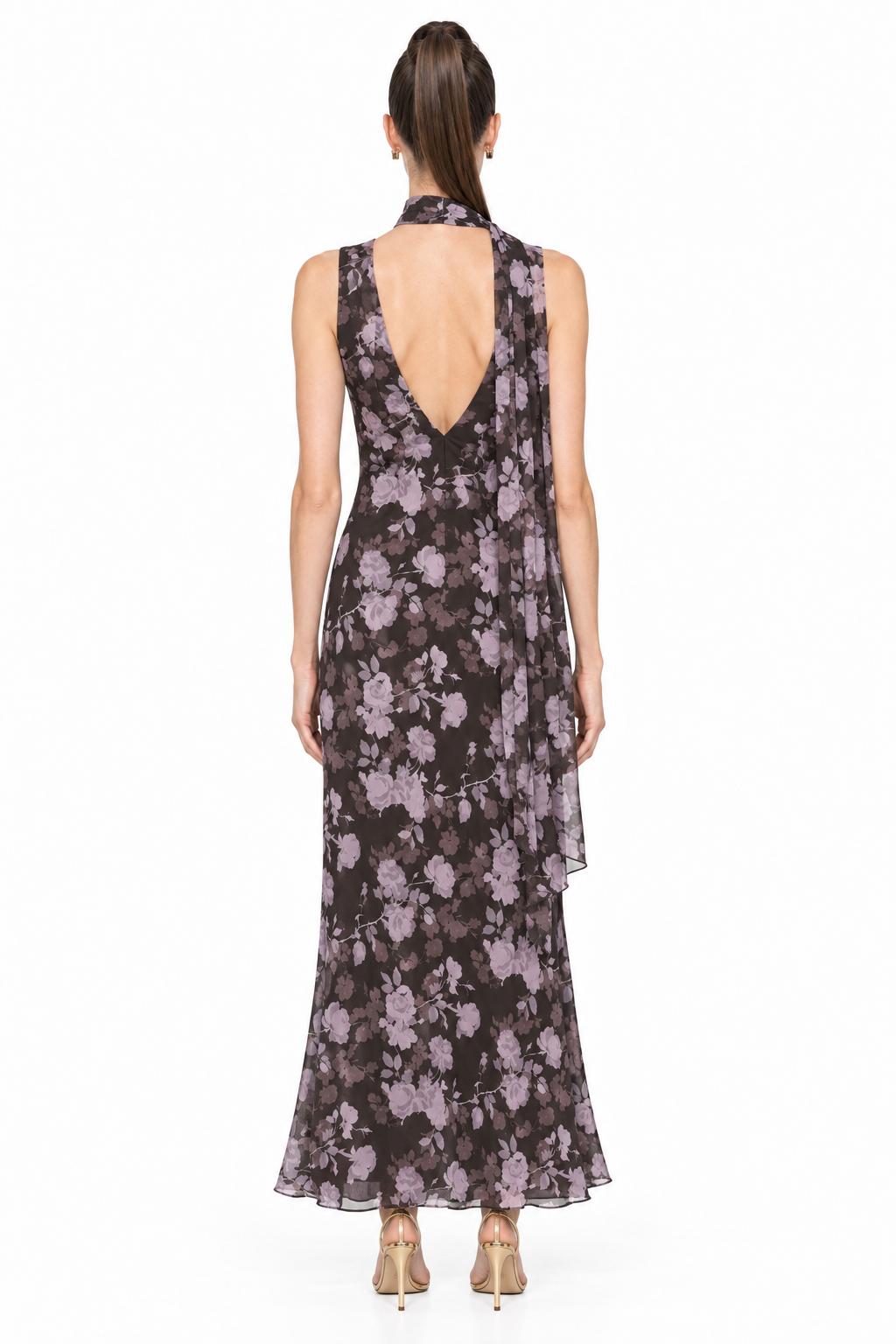 Back view of Sloane wearing Noelle floral chiffon maxi dress showing low V back and matching scarf