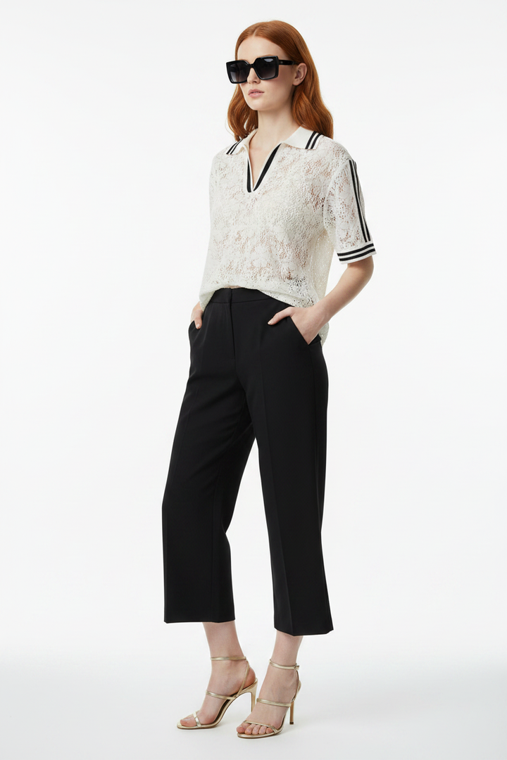 Redhead model, three-quarter pose, black trousers