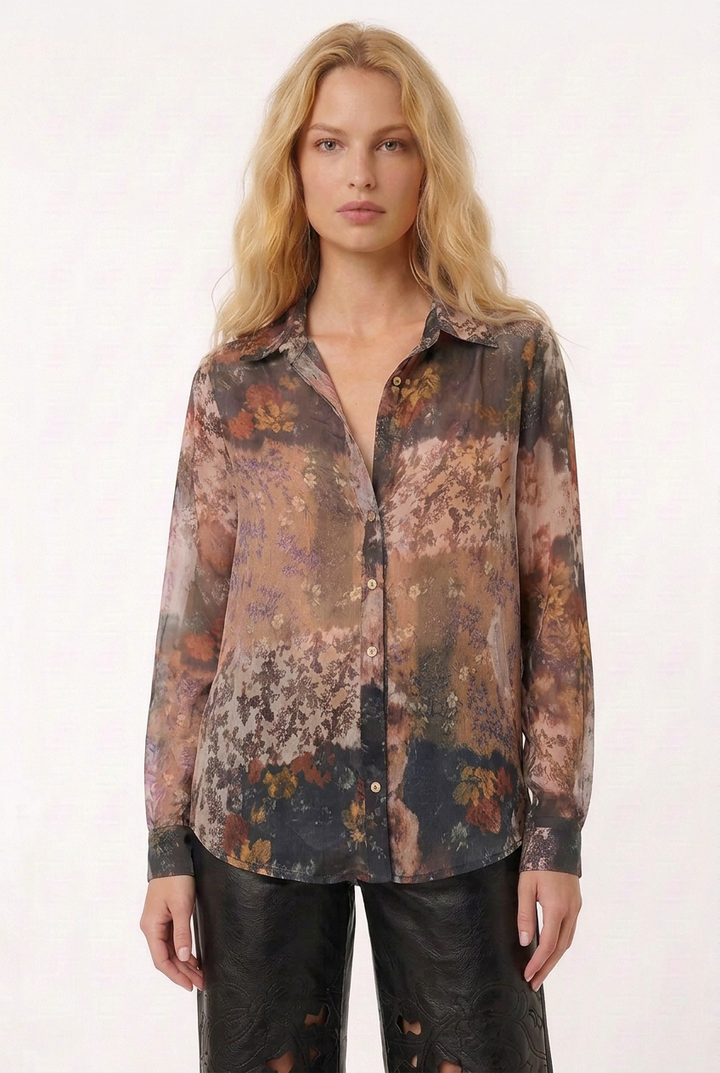 Waist-up view of Tricia wearing the Sheer Floral Print Blouse